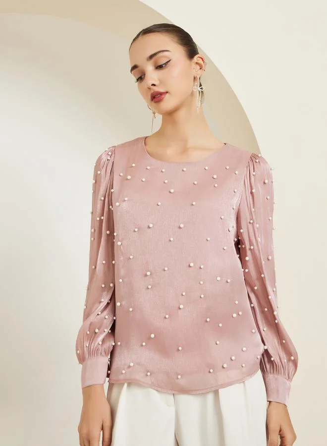ستايلي بلوزة منمقة بلؤلؤ صناعي وأكمام طويلة