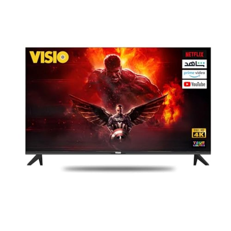 تلفزيون ذكي بدقة 4K UHD في غرفة المعيشة، وتصميم معدني أسود بدون إطار، وشاشة HDR Android 14 مع جهاز استقبال قمر صناعي مدمج، وWi-Fi وE-Share casting، ويتضمن حاملًا على الحائط - Image 1