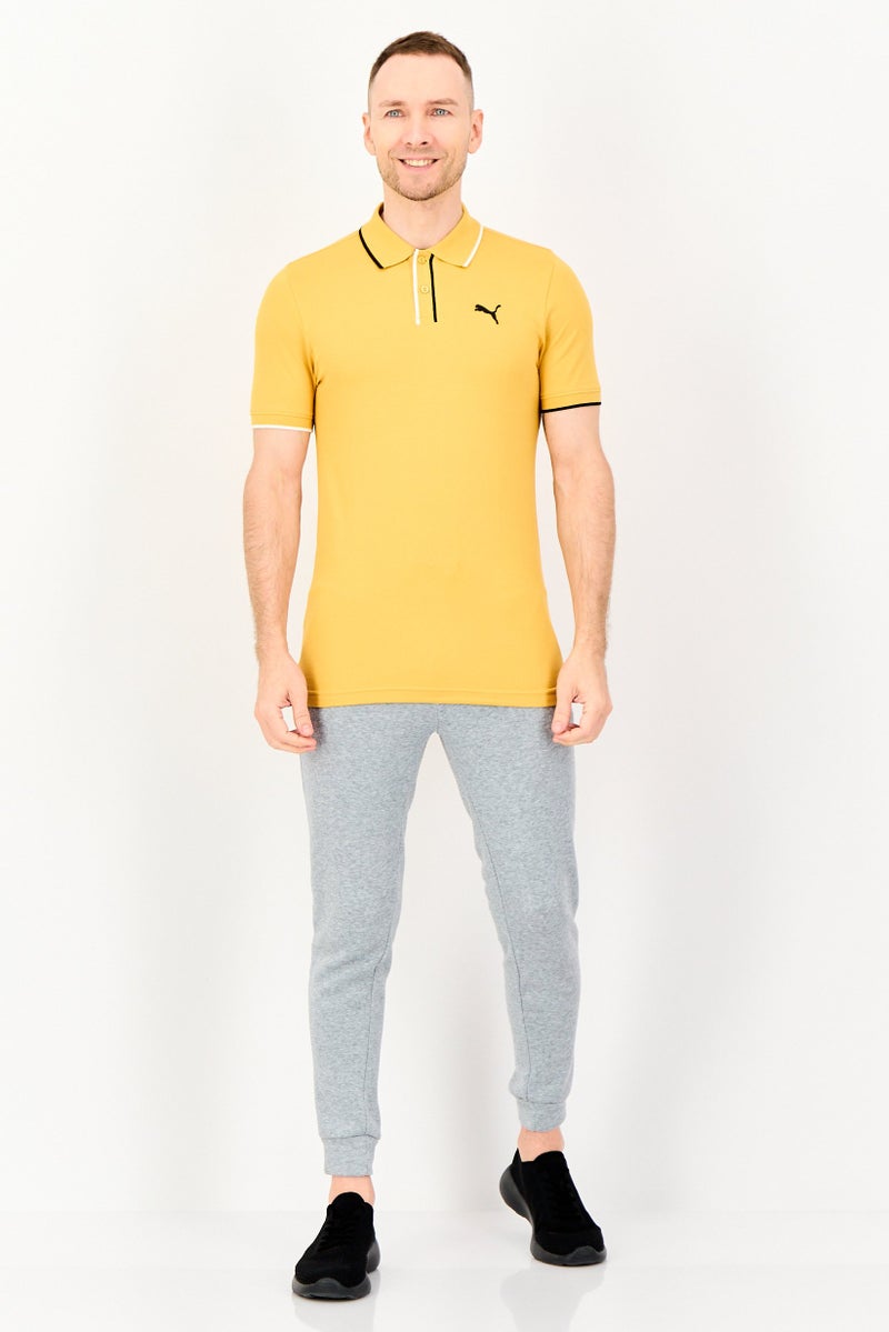 PUMA Men Slim Fit Short Sleeve Embroidered Logo Outdoor Polo Shirt, Mustard - Image 2