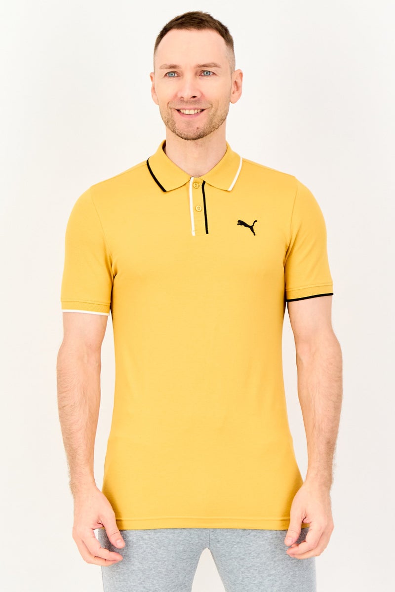 PUMA Men Slim Fit Short Sleeve Embroidered Logo Outdoor Polo Shirt, Mustard - Image 1