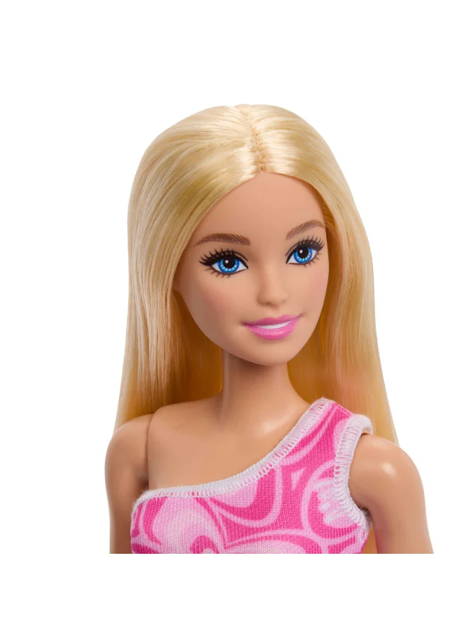 Barbie Dolls in Barbiecore-Inspired Outfits with Pink & Purple Heels, Variety of Pink Patterned Dresses and Hair Colors