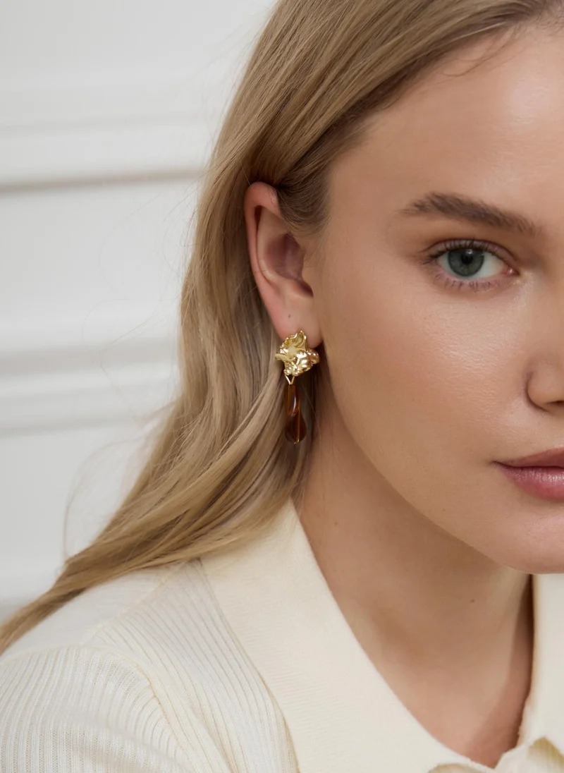 Complex shaped stud earrings with large stones