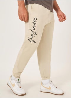 Styli Slogan Print Oversized Fit Cotton Terry Joggers  - Image 1