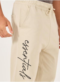Styli Slogan Print Oversized Fit Cotton Terry Joggers  - Image 4