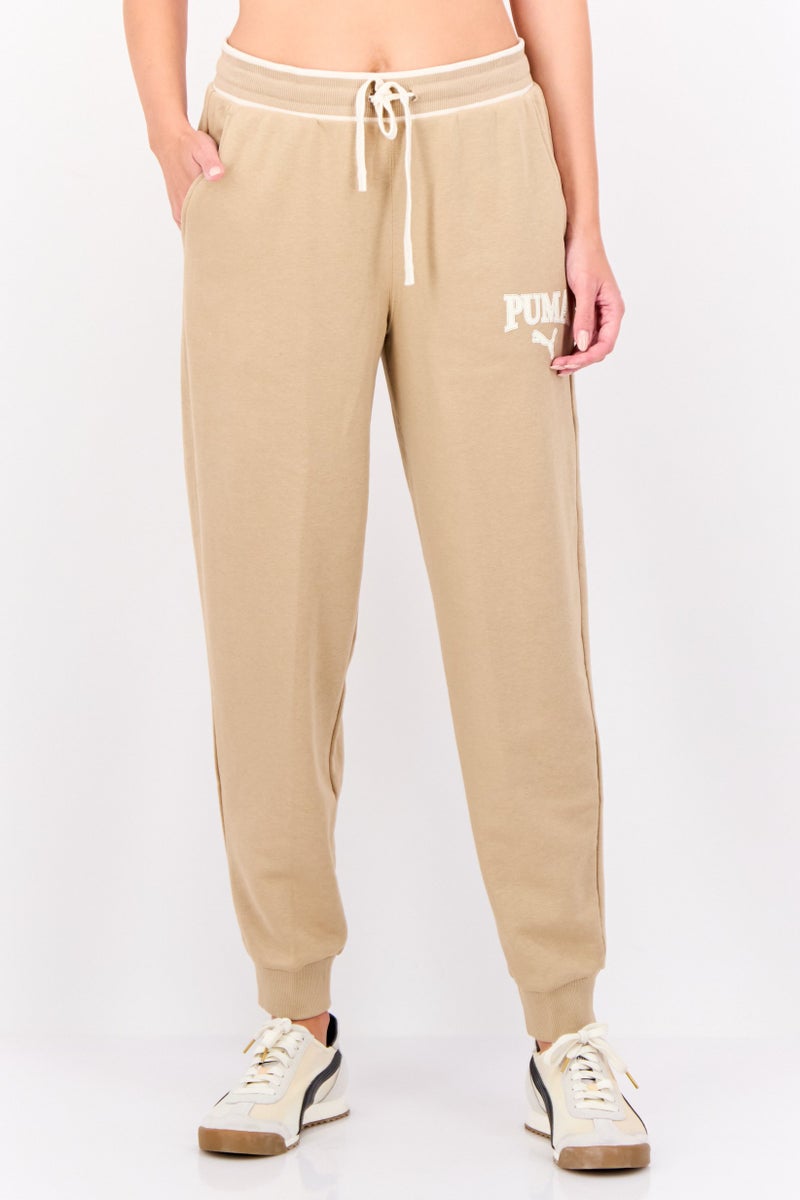 PUMA Women Sportswear Fit Brand Logo Training Sweatpants, Tan  - Image 1