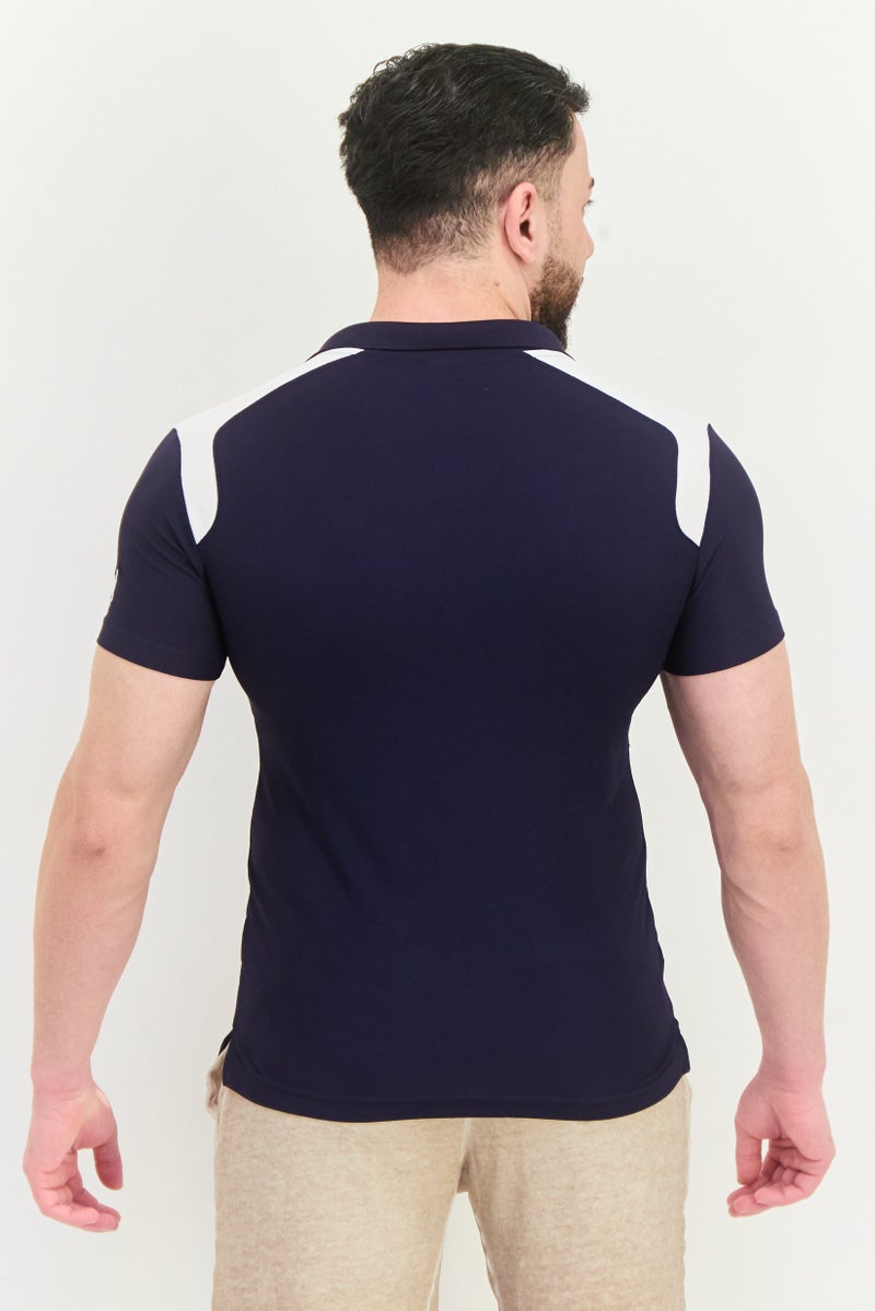 PUMA Men Sportswear Fit Short Sleeve Training Polo Shirt, Navy/White  - Image 3