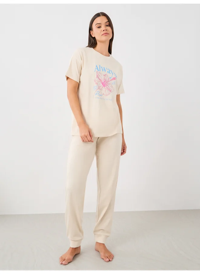 Styli Styli Unwind Graphic Print T-Shirt and Cuffed Pyjama Set