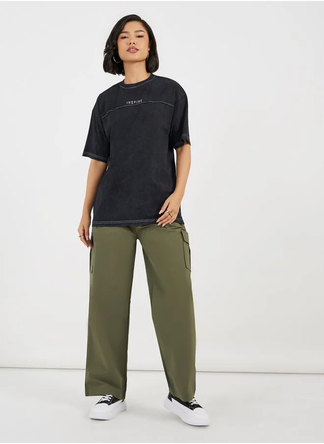 Styli Oversized T-Shirt With Print and Acid Wash In Single Jersey Fabric