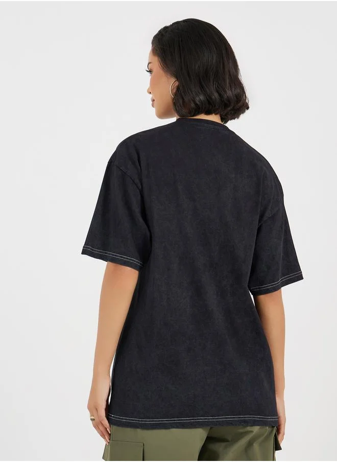 Styli Oversized T-Shirt With Print and Acid Wash In Single Jersey Fabric