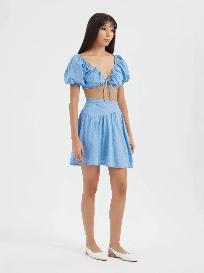 HICCUP 2 Pieces: Sweetheart Neck Tie Front Crop Top with a Puff Sleeve & Embroidered High Waist Elastic Waist Mini Skirt