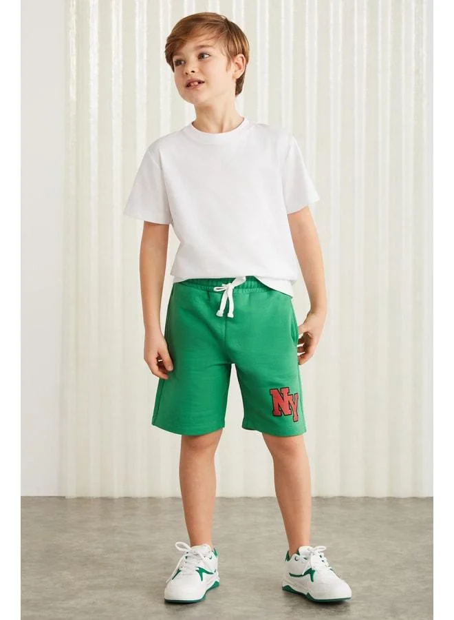 جريميلانج Darvell-grm24007 شورتات صبيان مطبوعة 100٪ قطن من Benetton باللون الأخضر.