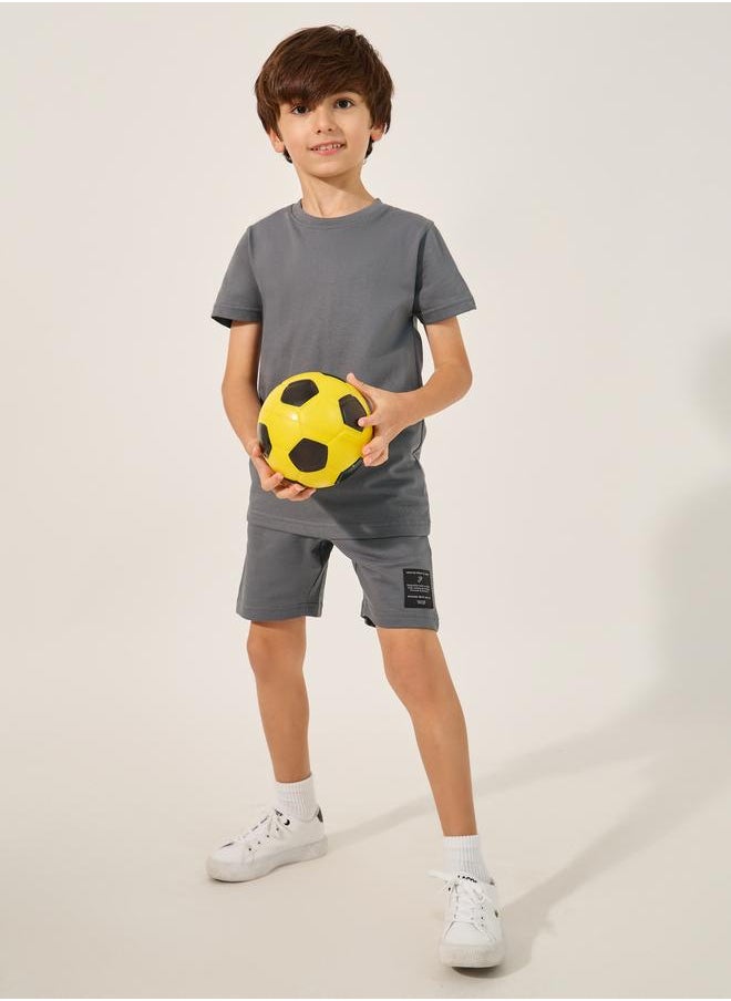 Styli Styli Badge Detail Short Sleeve T-Shirt and Shorts Co-Ords  - Image 1