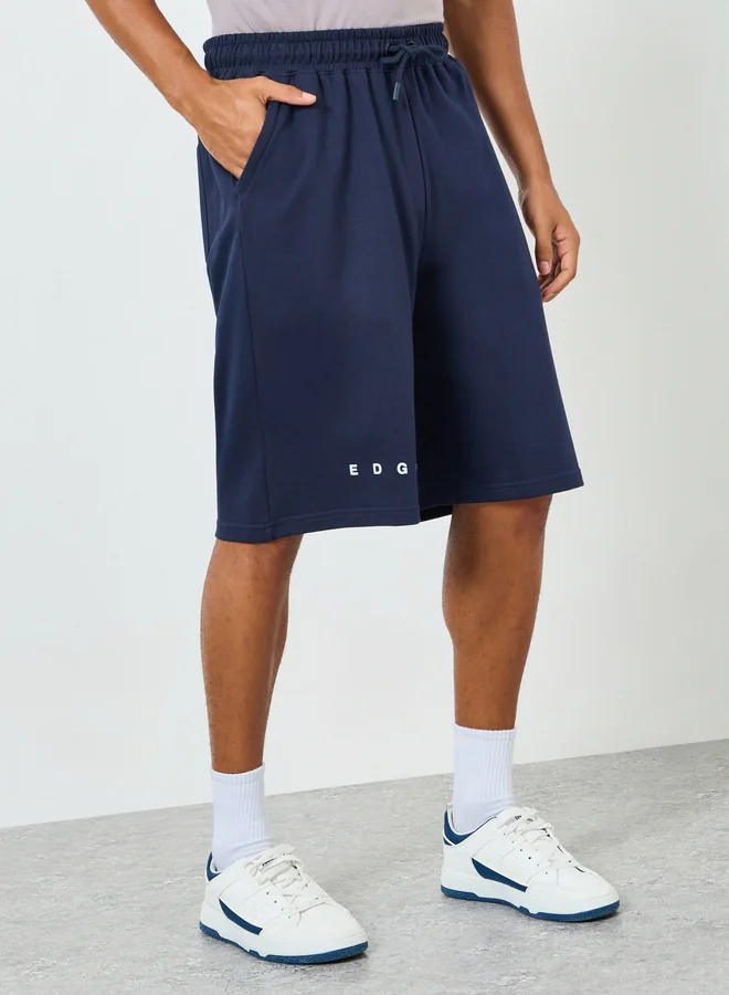 ستايلي شورت تيري رجالي فضفاض بطبعة عالية الدقة