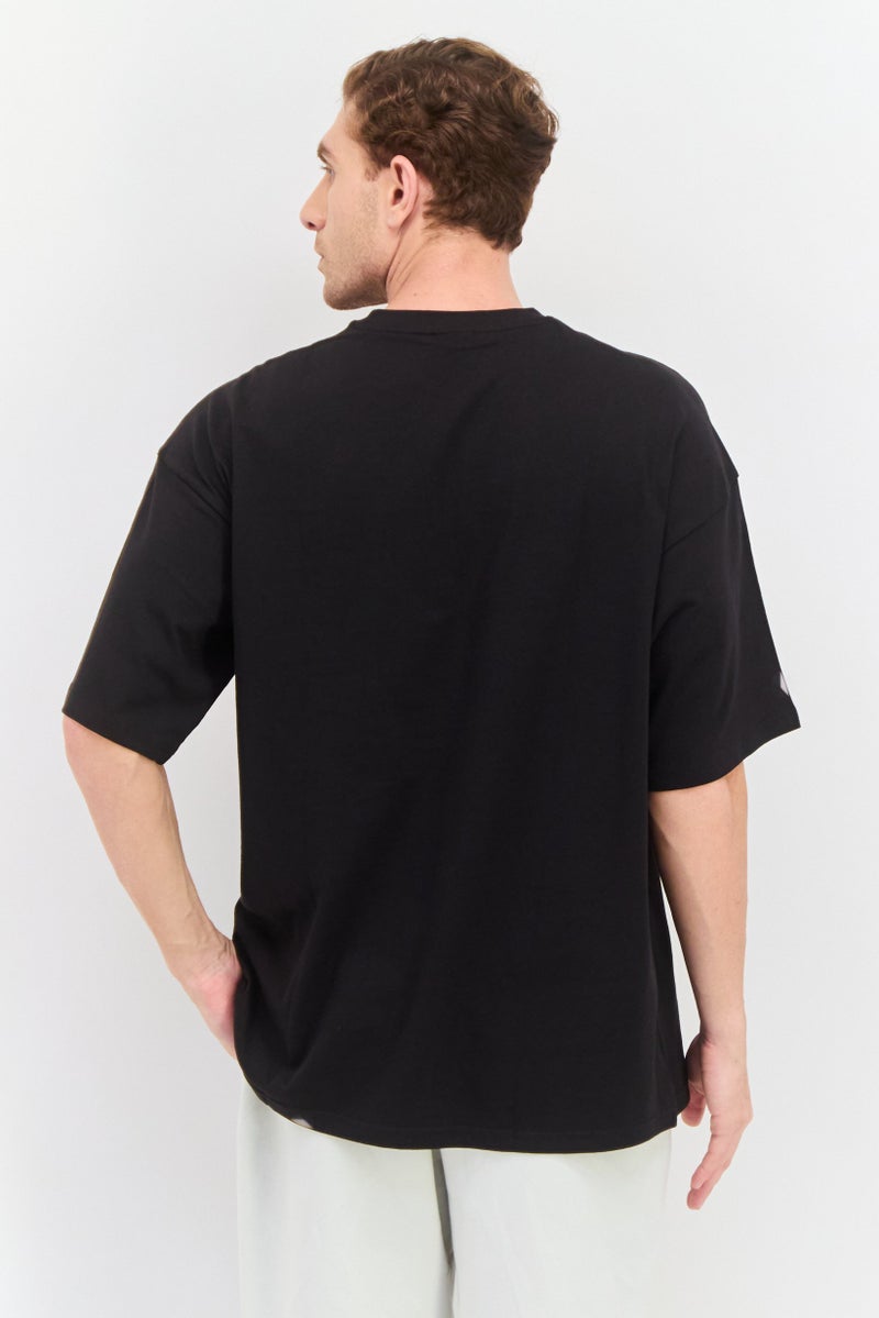 PUMA تي شيرت تدريب قصير الأكمام للرجال بحجم كبير، أسود - Image 3