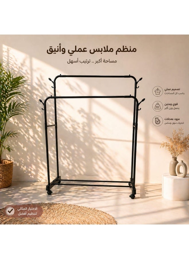 ستاند ملابس مزدوج قابل للتعديل بعجلات، حامل ملابس معدني قوي لتنظيم وتعليق الملابس والمعاطف والفساتين والأحذية، منظم تخزين عملي لغرفة النوم والمغسلة بتصميم أسود عصري - Image 1