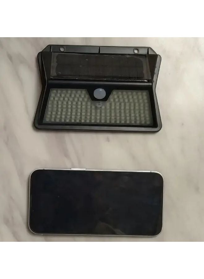 4 قطع مصابيح شمسية خارجية باللون الأبيض الدافئ مع حساس حركة IP65 - Image 4