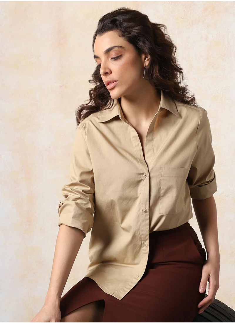 HIGH STAR Stay effortlessly stylish with this comfortable Beige Oversized Shirts Solid design crafted from 100% Cotton featuring Long Sleeves with Button closure.