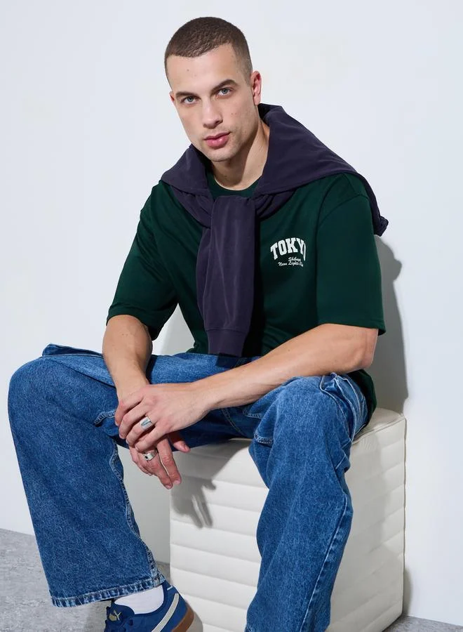 ستايلي Men Green Oversized Graphic Crew Neck T-Shirt