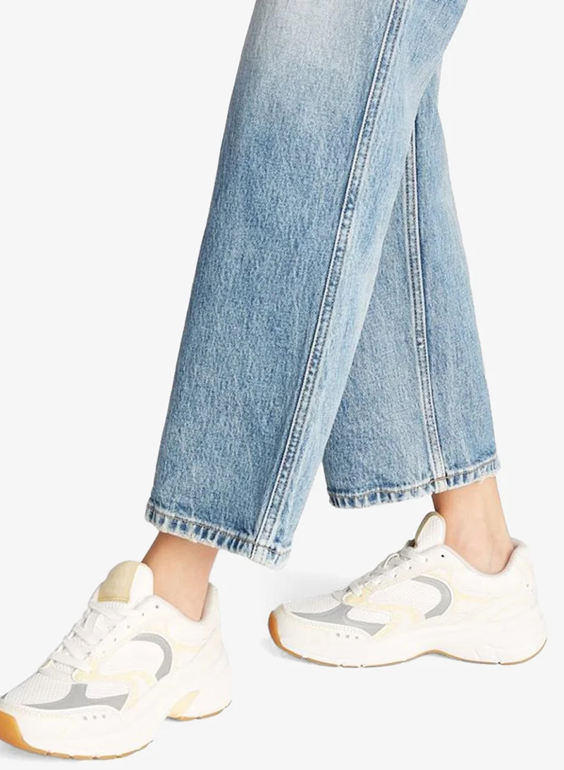 تومي جينز أرشيف'25 ترينرز