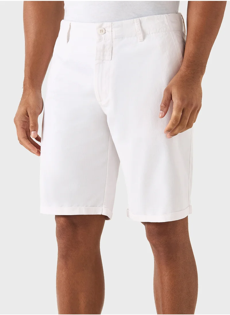 ايكونيك Iconic Solid Slim Fit Shorts with Button Closure