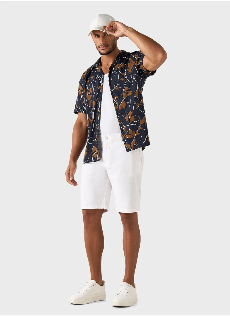 Iconic Iconic Solid Slim Fit Shorts with Button Closure
