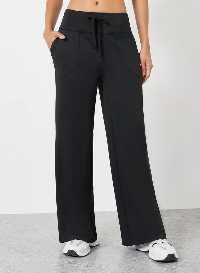 ستايلي اكتيف بنطال واسع مستقيم بخصر عريض ورباط