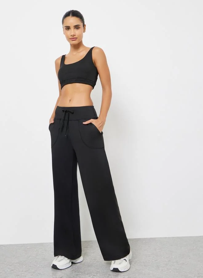 ستايلي اكتيف بنطال واسع مستقيم بخصر عريض ورباط