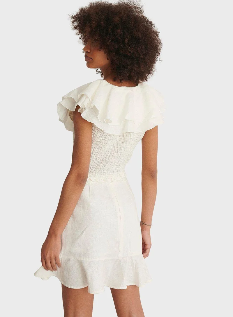 نا-كد بلوزة مكشكشة بأكمام قصيرة