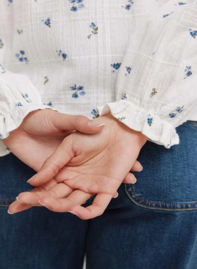 Springfield  Long sleeve checked blouse with fringed cuffs, front buttons, open V-neck mandarin collar, and floral print. for Women | Best Price UAE