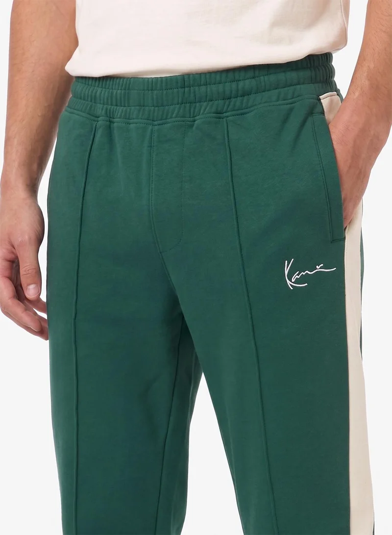 Karl Kani  Signature Sidestripe Pique Trackpants for Men | Best Price UAE
