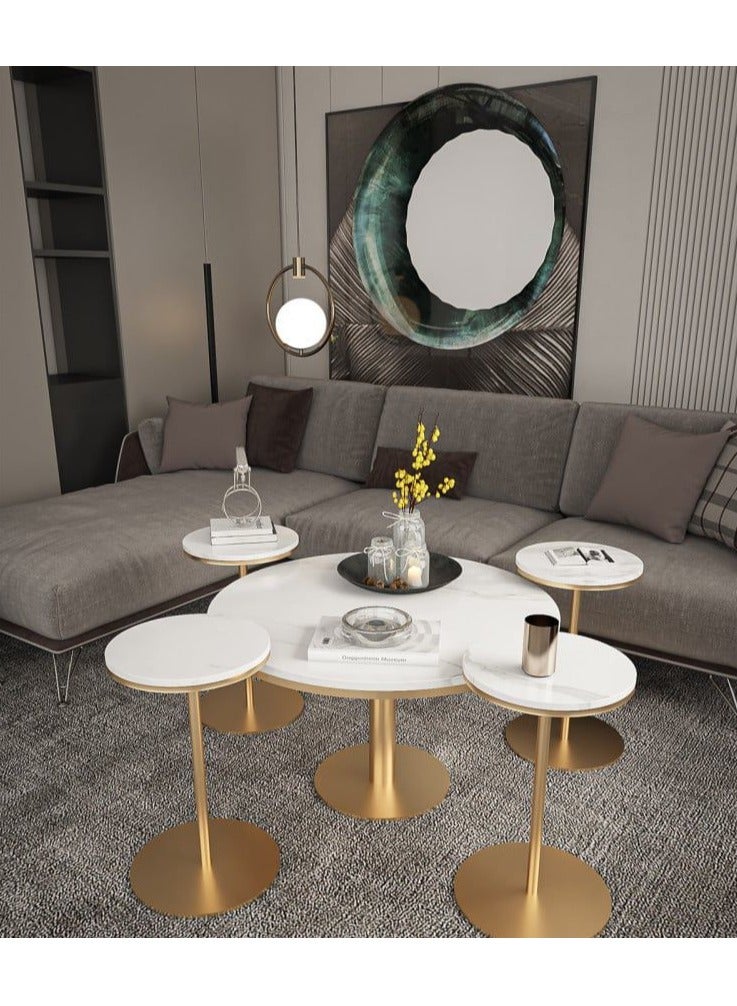 ZAHRAT ALFKHAMAH A hospitality set with a modern design, a large coffee table and four service tables, the metal legs are iron coated with oven paint and the shelf is made of wood and its shape is according to your choice, with the possibility of inserting the service tables into the large table to take advantage of the space you have. - Image 1