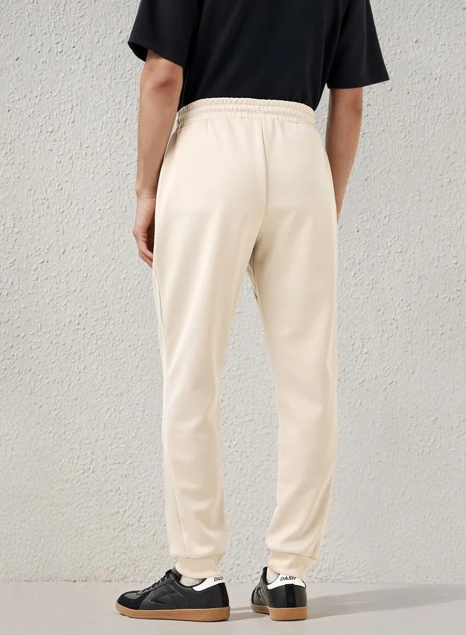 Kappa  Kappa Regular Fit Joggers with Pockets for Men | Best Price UAE