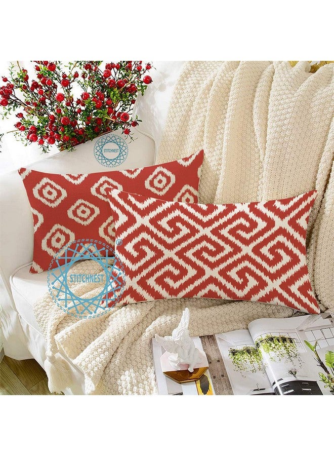STITCHNEST أغطية وسائد من القطن والبوليستر بطبعة إيكات هندسية حمراء من ستشنيست، مجموعة حمراء من 2 (12 × 18 بوصة) - Image 1