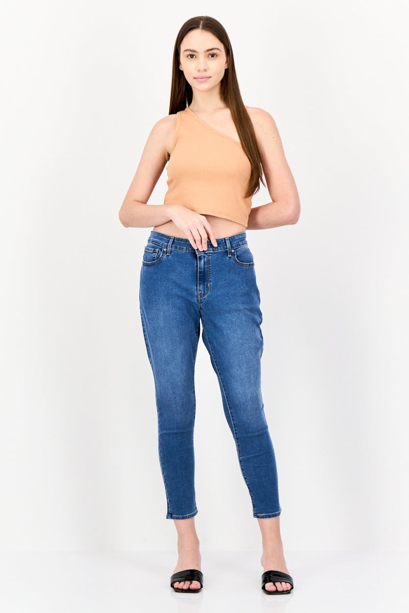 Levi's جينز ضيق للنساء، مغسول، أزرق متوسط - Image 4