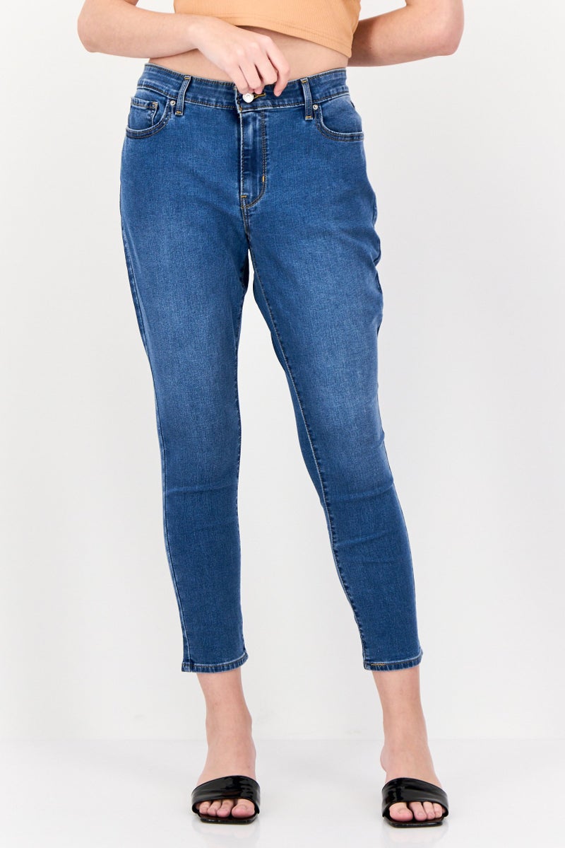 Levi's جينز ضيق للنساء، مغسول، أزرق متوسط - Image 1