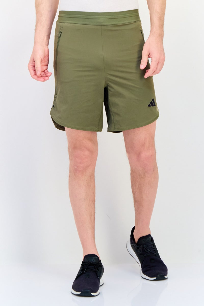 Adidas شورتات تدريب رياضية للرجال بطول 7 إنش، زيتوني - Image 1