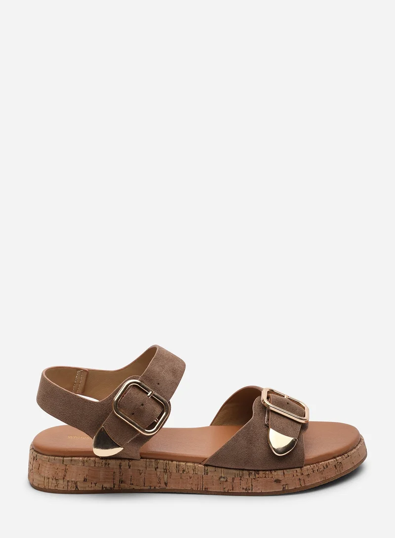 من أين هذه Iridia Double Buckle Camel Suede Low Wedge Sandal
