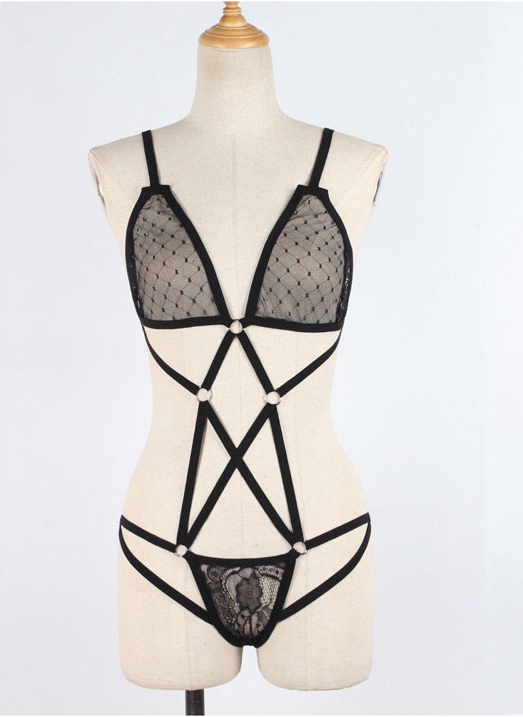 Ward Women's jumpsuit consists of one piece of lace attached to some belts and loops  - Image 1