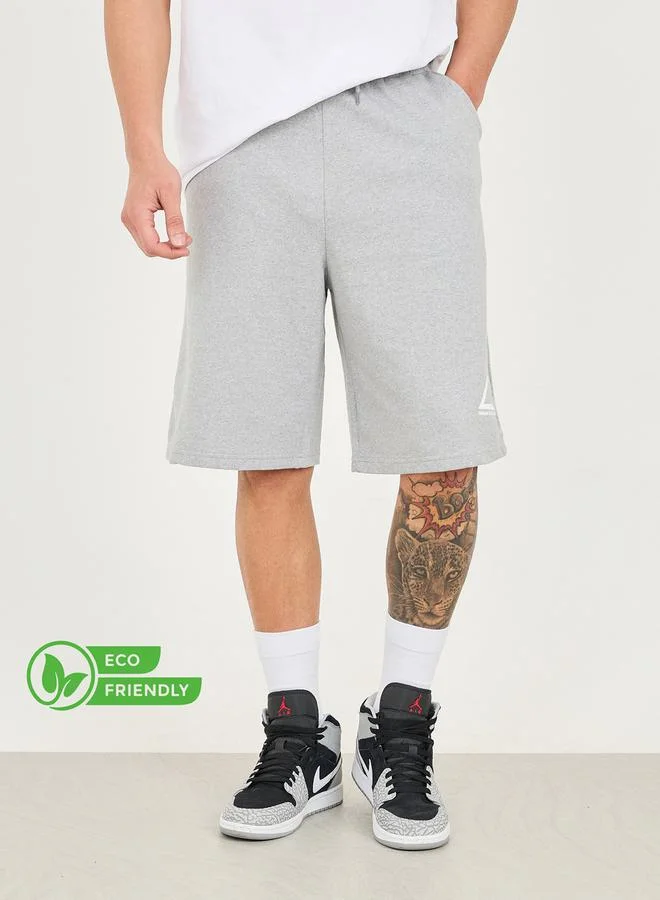 ستايلي Eco Earth Graphic Printed Melange Oversized Athleisure Shorts