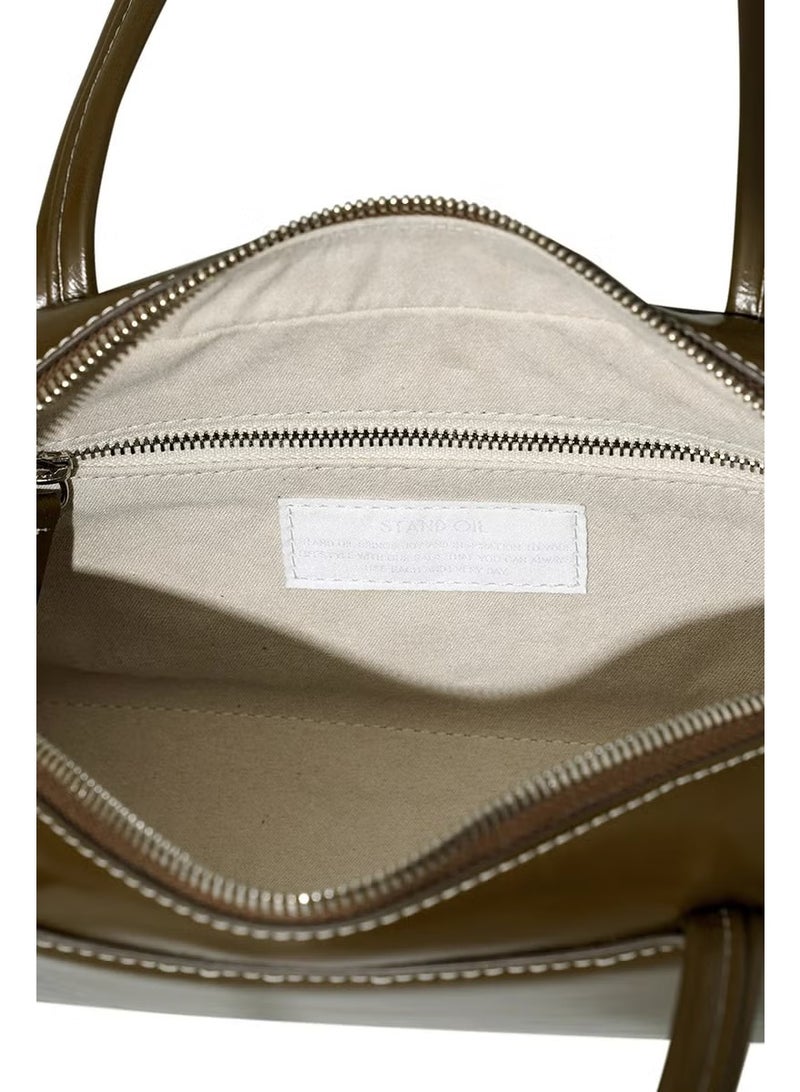 ستاند حقيبة كتف جلدية لحمل زيت الحامل - Image 5