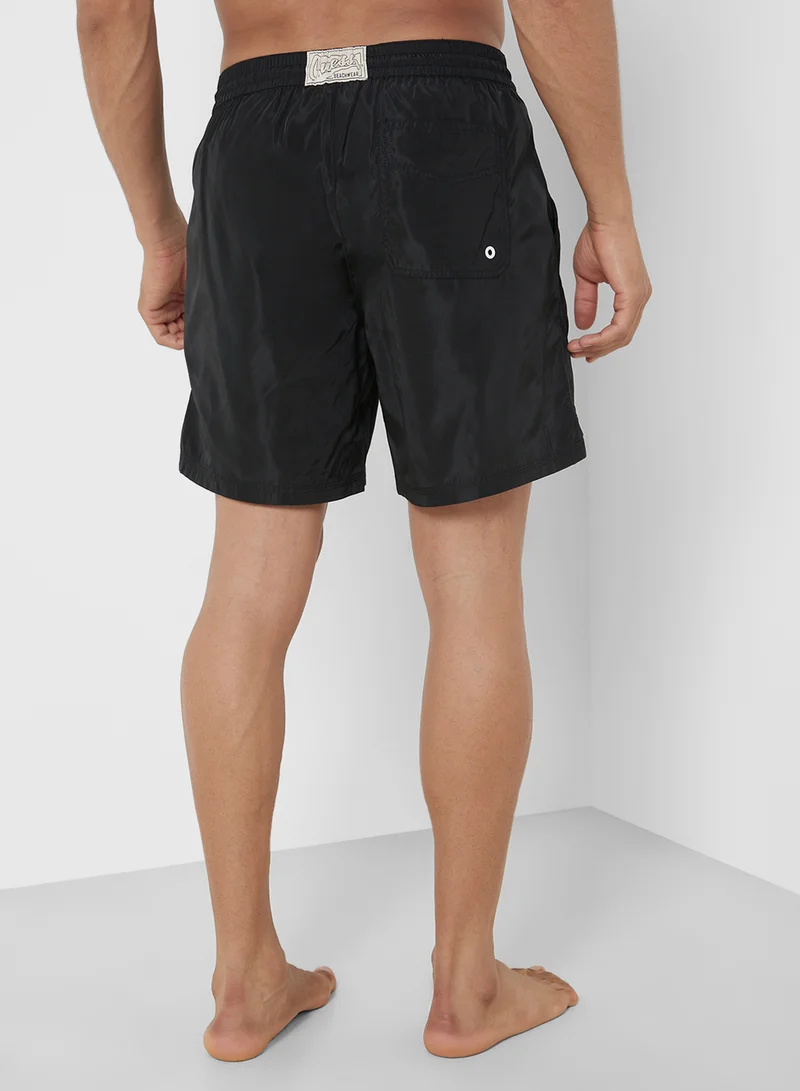 جس Logo Swim Shorts