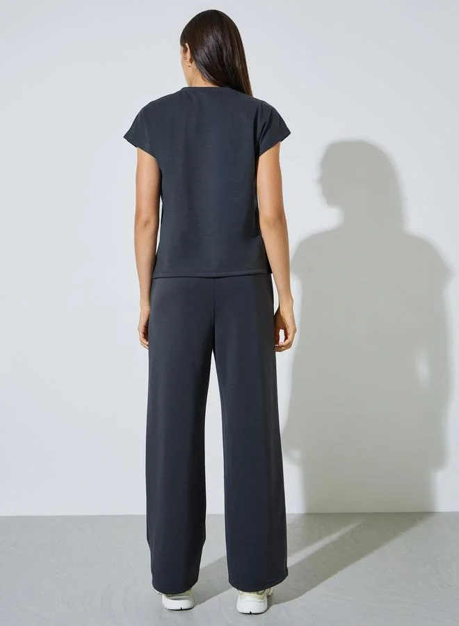 Styli  Charcoal Solid Round Neck T-Shirt and Joggers Co-ord Set for Women | Best Price UAE