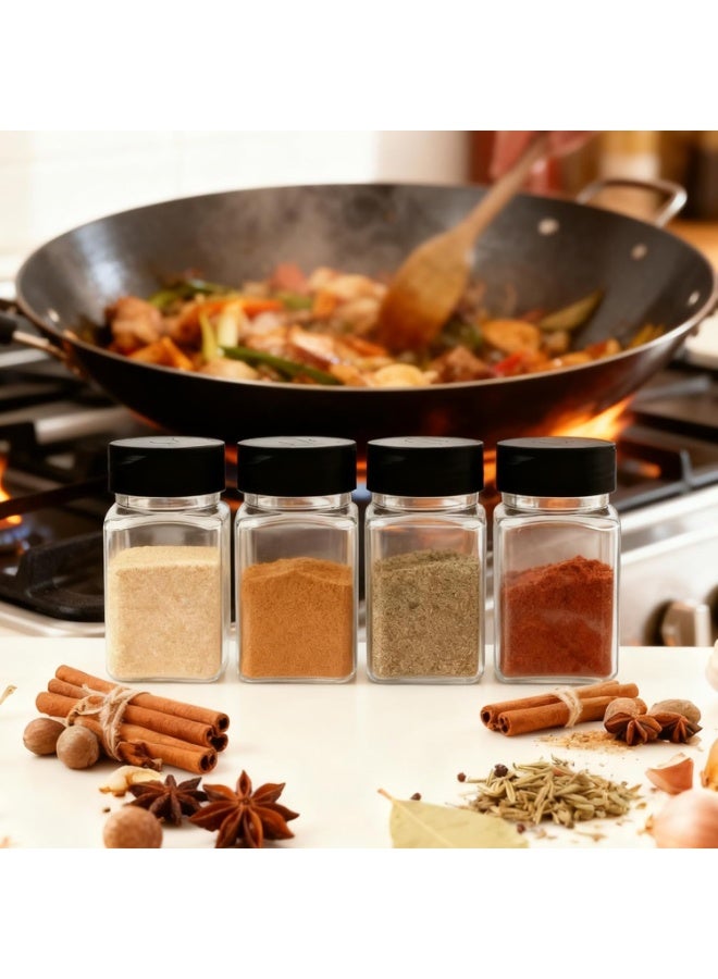 طقم برطمانات توابل بلاستيكية - 9 قطع  طقم مكون من 9 قطع من برطمانات التوابل البلاستيكية بسعة 12 أونصة (حوالي 355 مل)، تأتي بتصميم مربع شفاف مع أغطية سوداء محكمة الغلق. الزجاجات مزودة بفتحات رش (Shaker) وتتضمن ملصقات لتنظيم وتخزين التوابل، القهوة، الشاي، والأعشاب بشكل أنيق وعصري. - Image 2
