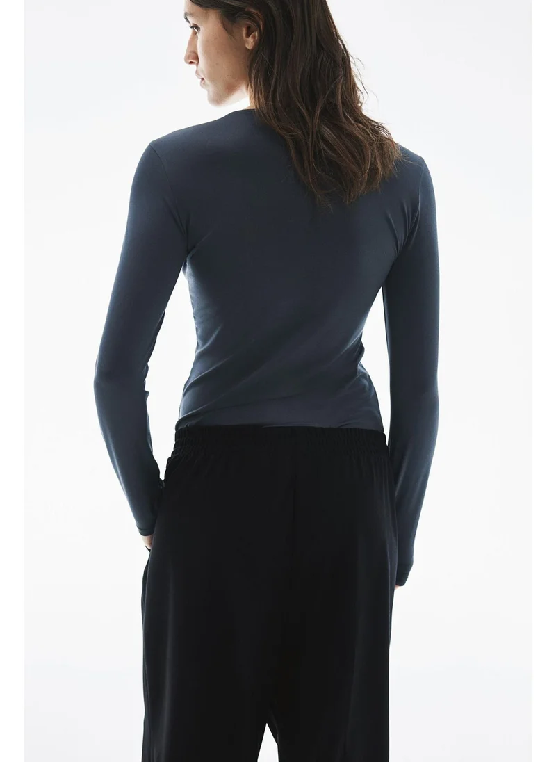H&M Wide crease-detail trousers