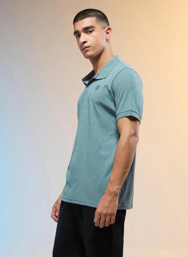 تكنوسبورت تيشيرت بولو رجالي بقصة ضيقة بنقشة جاكار من تكنوسبورت