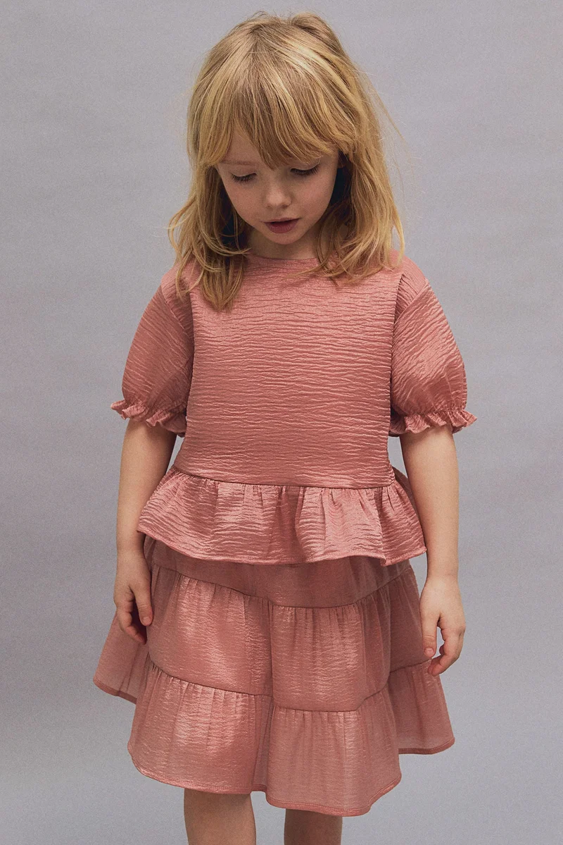 اتش اند ام بلوزة بحافة بيبلوم