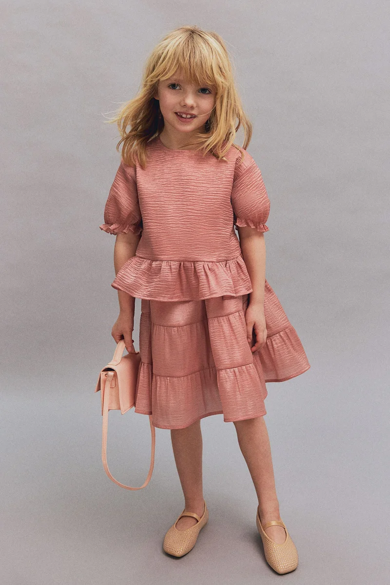 اتش اند ام بلوزة بحافة بيبلوم