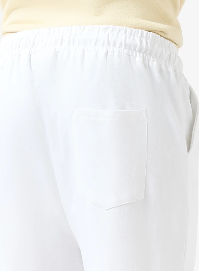 سفنتي فايف بنطلون رياضي واسع بطبعة نصية