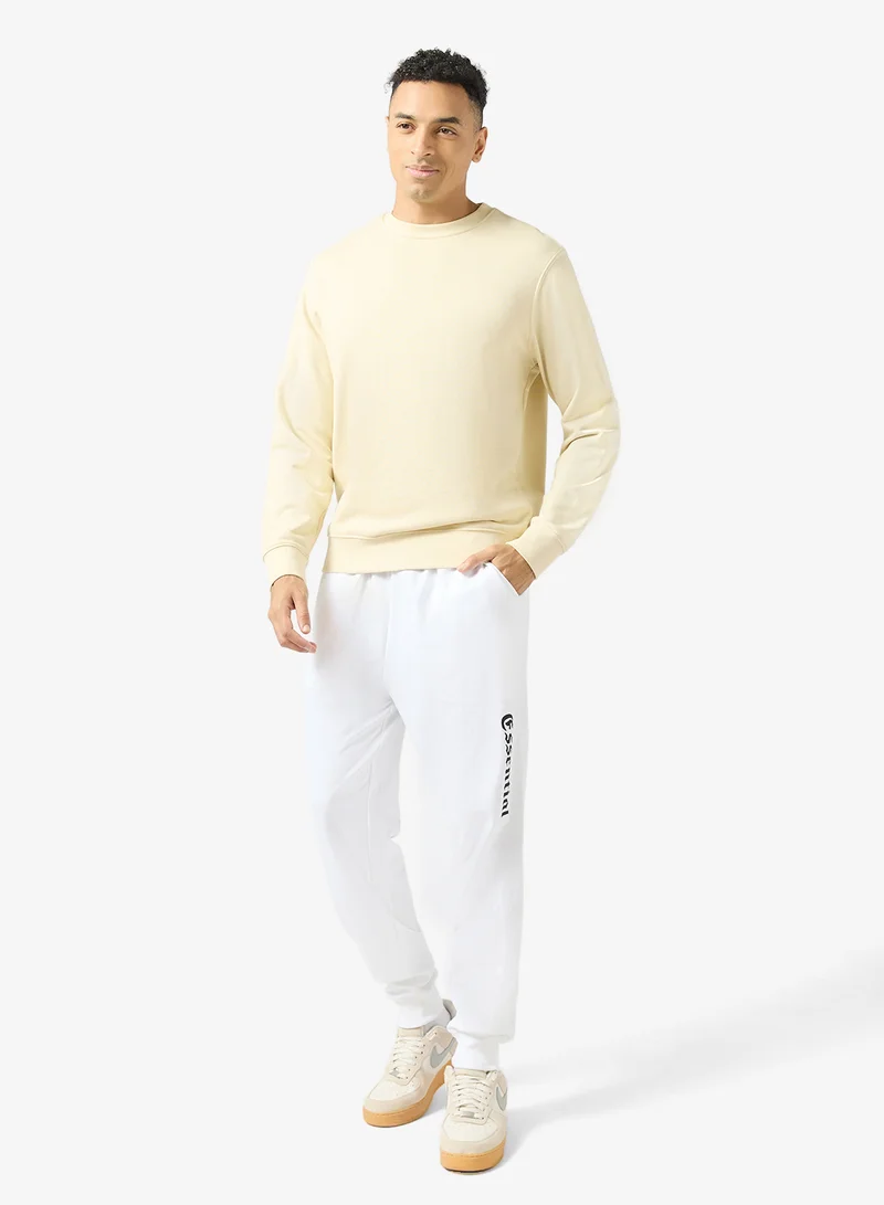 سفنتي فايف بنطلون رياضي واسع بطبعة نصية