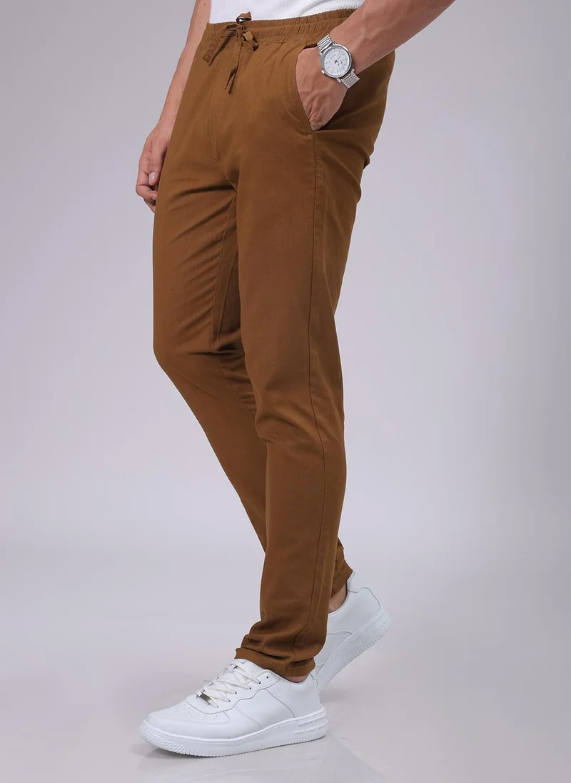 ذا انديان كراج كو Men Slim Solid Brown Joggers